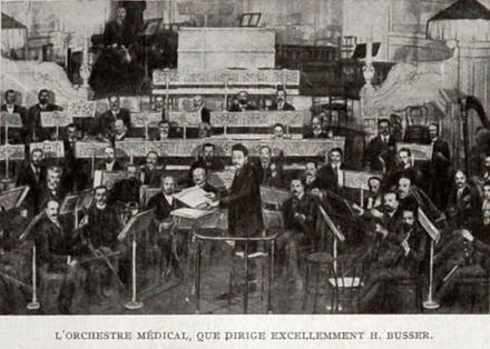 Henri Busser dirigeant l'orchestre médical